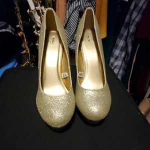 Gold platform heels